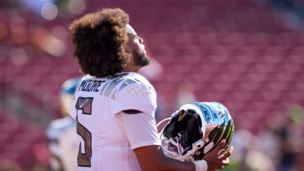 Dante Moore knocked out with brutal hit to the head while sliding