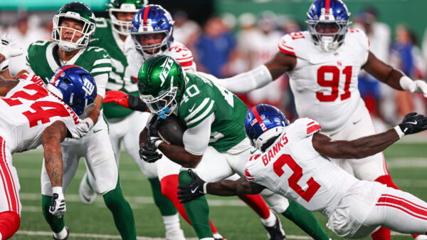 Jets rookie RB Chip Trayanum transported to hospital with neck injury