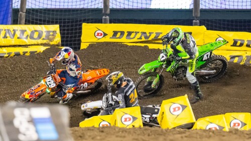 SX 2024 Rd 01 Anaheim Julien Beaumer races RJ Hampshire and Levi Kitchen.JPG